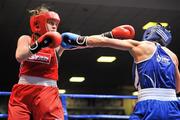 3 February 2012; Michaela Walsh, left, Holy Family Boxing Club, Belfast, Co. Antrim, exchanges punches with Dervla Duffy, Ryston Boxing Club, Co. Kildare, during their 57kg Bout. 2012 National Elite Boxing Championship Finals, National Stadium, Dublin. Picture credit: David Maher / SPORTSFILE