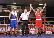 3 February 2012; Joe Ward, right, Moate Boxing Club, Co. Westmeath, is declared the winner by referee Ferdy Whelan after defeating Kenneth Egan, Neilstown Boxing Club, Dublin, in their 81kg Bout. 2012 National Elite Boxing Championship Finals, National Stadium, Dublin. Picture credit: David Maher / SPORTSFILE