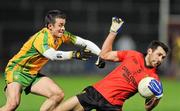 4 February 2012; Aidan Brannigan, Down, in action against David Walsh, Donegal. Allianz Football League, Division 1, Round 1, Down v Donegal, Pairc Esler, Newry, Co. Down. Picture credit: Oliver McVeigh / SPORTSFILE