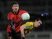 4 February 2012; Peter Turley, Down, in action against Leo McLoone, Donegal. Allianz Football League, Division 1, Round 1, Down v Donegal, Pairc Esler, Newry, Co. Down. Picture credit: Oliver McVeigh / SPORTSFILE