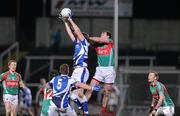 4 February 2012; Kevin Meaney, Laois, in action against Seamus O'Shea, Mayo. Allianz Football League, Division 1, Round 1, Laois v Mayo, O'Moore Park, Portlaoise, Co. Laois. Picture credit: Matt Browne / SPORTSFILE