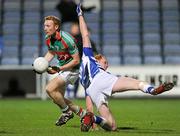 4 February 2012; Richie Feeney, Mayo, in action against Padraig Clancy, Laois. Allianz Football League, Division 1, Round 1, Laois v Mayo, O'Moore Park, Portlaoise, Co. Laois. Picture credit: Matt Browne / SPORTSFILE