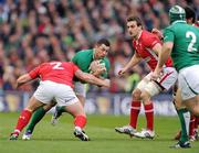 5 February 2012; Rob Kearney, Ireland, is tackled by Huw Bennett, and Sam Warburton, right, Wales. RBS Six Nations Rugby Championship, Ireland v Wales, Aviva Stadium, Lansdowne Road, Dublin. Picture credit: Brian Lawless / SPORTSFILE