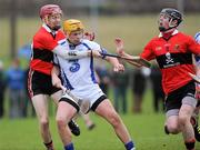 5 February 2012; Martin O'Neill, Waterford, in action against Stephen Maher, left, and Brian Murray,11, UCC. Waterford Crystal Cup Hurling, Quarter-Final, Waterford v UCC, WIT Sportsgrounds, Waterford. Picture credit: Matt Browne / SPORTSFILE
