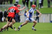 5 February 2012; Seamus Prendergast, Waterford, in action against Patrick O'Mahony and Dara Fives,24, UCC. Waterford Crystal Cup Hurling, Quarter-Final, Waterford v UCC, WIT Sportsgrounds, Waterford. Picture credit: Matt Browne / SPORTSFILE