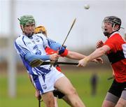 5 February 2012; Paul O'Brien, Waterford, in action against Brian Murray and Seamus Corry, UCC. Waterford Crystal Cup Hurling, Quarter-Final, Waterford v UCC, WIT Sportsgrounds, Waterford. Picture credit: Matt Browne / SPORTSFILE