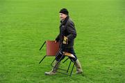 5 February 2012; Paddy Butler, pitch co-ordinator at the St. Lachtin's GAA Club, arrives with a table and chair for the 4th official. Allianz Football League, Division 4, Round 1, Kilkenny v Wicklow, Freshford GAA Grounds, Freshford, Co. Kilkenny. Picture credit: Ray McManus / SPORTSFILE
