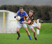 5 February 2012; Nicky Mernagh, Wicklow, is tackled by Kilkenny's Michael Malone. Allianz Football League, Division 4, Round 1, Kilkenny v Wicklow, Freshford GAA Grounds, Freshford, Co. Kilkenny. Picture credit: Ray McManus / SPORTSFILE