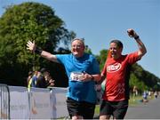 17 June 2017; Brendan Nolan, left, celebrates after competing in the Irish Runner 5 Mile at the Phoenix Park in Dublin. Photo by Sam Barnes/Sportsfile