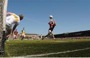 17 June 2017; John Egan of Westmeath palms the ball to the net to score his side's first goal as Offaly goalkeeper Alan Mulhall looks on during the Leinster GAA Football Senior Championship Quarter-Final Replay match between Westmeath and Offaly at TEG Cusack Park in Mullingar, Co Westmeath. Photo by Piaras Ó Mídheach/Sportsfile