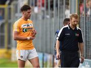 17 June 2017; Jack Dowling of Antrim, left, leaves the field after being shown a red card during the GAA Football All-Ireland Senior Championship Round 1A match between Sligo and Antrim at Markievicz Park in Sligo. Photo by Seb Daly/Sportsfile