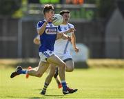 17 June 2017; Trevor Collins of Laois in action against Peadar Traynor of Wicklow  during the GAA Football All-Ireland Senior Championship Round 1A match between Wicklow and Laois at Joule Park in Aughrim, Co Wicklow. Photo by Ray McManus/Sportsfile