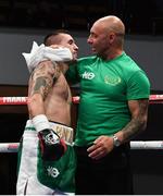 17 June 2017; David Oliver Joyce is congratulated by trainer Pete Taylor after defeating Gabor Kovacs during their Lightweight bout at the Battle of Belfast Fight Night at the Waterfront Hall in Belfast. Photo by Ramsey Cardy/Sportsfile
