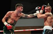 17 June 2017; Tyrone McKenna, left, in action against Ferenc Katona during their Super Lightweight boutat the Battle of Belfast Fight Night at the Waterfront Hall in Belfast. Photo by Ramsey Cardy/Sportsfile