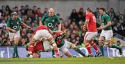 5 February 2012; Stephen Ferris, Ireland, tackles Ian Evans, Wales, for which he received a yellow card from referee Wayne Barnes. RBS Six Nations Rugby Championship, Ireland v Wales, Aviva Stadium, Lansdowne Road, Dublin. Picture credit: Stephen McCarthy / SPORTSFILE