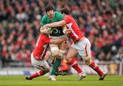 5 February 2012; Stephen Ferris, Ireland, is tackled by Jonathan Davies and Jamie Roberts, right, Wales. RBS Six Nations Rugby Championship, Ireland v Wales, Aviva Stadium, Lansdowne Road, Dublin. Picture credit: Stephen McCarthy / SPORTSFILE