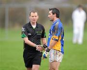 5 February 2012; Referee Niall Ward shakes hands with Wicklow corner back Ciaran Hyland after the final whistle. Allianz Football League, Division 4, Round 1, Kilkenny v Wicklow, Freshford GAA Grounds, Freshford, Co. Kilkenny. Picture credit: Ray McManus / SPORTSFILE