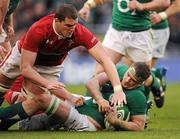 5 February 2012; Sam Warburton, Wales, attempts to steal the ball from Jamie Heaslip, Ireland. RBS Six Nations Rugby Championship, Ireland v Wales, Aviva Stadium, Lansdowne Road, Dublin. Picture credit: Brendan Moran / SPORTSFILE
