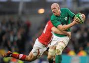 5 February 2012; Paul O'Connell, Ireland, is tackled by George North, Wales. RBS Six Nations Rugby Championship, Ireland v Wales, Aviva Stadium, Lansdowne Road, Dublin. Picture credit: Stephen McCarthy / SPORTSFILE
