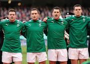 5 February 2012; Ireland players, from left, Fergus McFadden, David Kearney, Rob Kearney and Jonathan Sexton during the National Anthems. RBS Six Nations Rugby Championship, Ireland v Wales, Aviva Stadium, Lansdowne Road, Dublin. Picture credit: Stephen McCarthy / SPORTSFILE