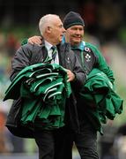 5 February 2012; Ireland team manager Michael Kearney, left, and baggage master Paddy 'Rala' O'Reilly carry the team jerseys back to the dressing room after the official team photograph. RBS Six Nations Rugby Championship, Ireland v Wales, Aviva Stadium, Lansdowne Road, Dublin. Picture credit: Brendan Moran / SPORTSFILE