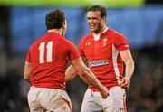 5 February 2012; Wales players Jamie Roberts, right, and George North celebrate their side's victory. RBS Six Nations Rugby Championship, Ireland v Wales, Aviva Stadium, Lansdowne Road, Dublin. Picture credit: Stephen McCarthy / SPORTSFILE