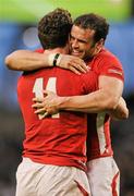 5 February 2012; Wales players Jamie Roberts, right, and George North celebrate their side's victory. RBS Six Nations Rugby Championship, Ireland v Wales, Aviva Stadium, Lansdowne Road, Dublin. Picture credit: Stephen McCarthy / SPORTSFILE