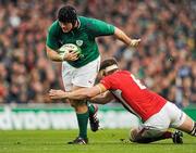 5 February 2012; Mike Ross, Ireland, is tackled by Ryan Jones, Wales. RBS Six Nations Rugby Championship, Ireland v Wales, Aviva Stadium, Lansdowne Road, Dublin. Picture credit: Stephen McCarthy / SPORTSFILE