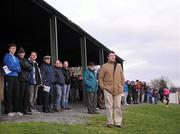 22 January 2012; Spectators watch on during the game. McGrath Cup Football Semi-Final, Tipperary v University College Cork, Clonmel Sportsfield, Clonmel, Co. Tipperary. Picture credit: Stephen McCarthy / SPORTSFILE