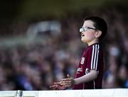 18 June 2017; Young Galway supporter Cian O'Connor, age 9, from Leitrim, Co Galway reacts after his side score a point during the Leinster GAA Hurling Senior Championship Semi-Final match between Galway and Offaly at O'Moore Park in Portlaoise, Co Laois. Photo by Seb Daly/Sportsfile