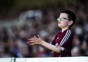 18 June 2017; Young Galway supporter Cian O'Connor, age 9, from Leitrim, Co Galway reacts after his side score a point during the Leinster GAA Hurling Senior Championship Semi-Final match between Galway and Offaly at O'Moore Park in Portlaoise, Co Laois. Photo by Seb Daly/Sportsfile