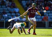 18 June 2017; Niall Burke of Galway scores a point while under pressure from Paddy Murphy of Offaly during the Leinster GAA Hurling Senior Championship Semi-Final match between Galway and Offaly at O'Moore Park in Portlaoise, Co Laois. Photo by Seb Daly/Sportsfile