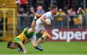 18 June 2017; Niall Sludden of Tyrone in action against Mícheál Carroll of Donegal during the Ulster GAA Football Senior Championship Semi-Final match between Tyrone and Donegal at St Tiernach's Park in Clones, Co. Monaghan. Photo by Ramsey Cardy/Sportsfile
