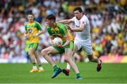 18 June 2017; Jason McGee of Donegal is tackled by Sean Cavanagh of Tyrone during the Ulster GAA Football Senior Championship Semi-Final match between Tyrone and Donegal at St Tiernach's Park in Clones, Co. Monaghan. Photo by Ramsey Cardy/Sportsfile