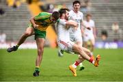 18 June 2017; Ronan McNamee of Tyrone in action against Micheal Carroll of Donegal  during the Ulster GAA Football Senior Championship Semi-Final match between Tyrone and Donegal at St Tiernach's Park in Clones, Co. Monaghan. Photo by Oliver McVeigh/Sportsfile
