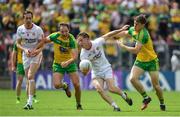 18 June 2017; Kieran McGeary of Tyrone is tackled by Hughie McFadden of Donegal during the Ulster GAA Football Senior Championship Semi-Final match between Tyrone and Donegal at St Tiernach's Park in Clones, Co. Monaghan. Photo by Ramsey Cardy/Sportsfile