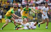 18 June 2017; Mattie Donnelly of Tyrone in action against Hughie McFadden, left, and Patrick McBrearty of Donegal during the Ulster GAA Football Senior Championship Semi-Final match between Tyrone and Donegal at St Tiernach's Park in Clones, Co. Monaghan. Photo by Ramsey Cardy/Sportsfile