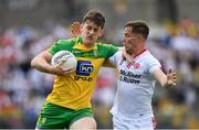 18 June 2017; Hughie McFadden of Donegal is tackled by Kieran McGeary of Tyrone during the Ulster GAA Football Senior Championship Semi-Final match between Tyrone and Donegal at St Tiernach's Park in Clones, Co. Monaghan. Photo by Ramsey Cardy/Sportsfile