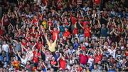 18 June 2017; Cork supporters in the stands celebrate a late point for their side during the Munster GAA Hurling Senior Championship Semi-Final match between Waterford and Cork at Semple Stadium in Thurles, Co Tipperary.  Photo by Ray McManus/Sportsfile