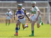 18 June 2017; Sean Rowley of Oylegate-Glenbrien, Co. Wexford in action against Brandon Hogan of Kanturk GAA, Club, Co. Cork during the Division 6 Final at the John West Féile na nGael national competition which took place this weekend across Carlow, Kilkenny and Waterford. This is the second year that the Féile na nGael and Féile Peile na nÓg have been sponsored by John West, one of the world’s leading suppliers of fish. The competition gives up-and-coming GAA superstars the chance to participate and play in their respective Féile tournament, at a level which suits their age, skills and strengths. Photo by Matt Browne/Sportsfile