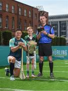 19 June 2017; As a long-standing sponsor of the GAA Hurling All-Ireland Senior Championship, Centra today launched #WeAreHurling, which celebrates the passion displayed by all of those in Ireland’s collective hurling community. #WeAreHurling reinforces Centra’s commitment to local communities across Ireland by shining a light on the many people who devote their lives to the game – making our national sport a pillar of Irish pride. Pictured today in attendance is Wexford hurler Lee Chin, left, young aspiring hurler Tadgh Rowe, age 10, from Kilmore, Co. Wexford, and referee James Owens, during the Centra Hurling Media Launch at Smithfield Square & The Lighthouse Cinema, in Dublin 7. Photo by Seb Daly/Sportsfile