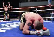 17 June 2017; Stephen Ormond, right, recovers from a knock down by Craig Evans in the tenth round during their WBO European lightweight title bout at the Battle of Belfast Fight Night at the Waterfront Hall in Belfast. Photo by Ramsey Cardy/Sportsfile