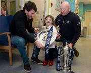 8 February 2012; RBS 6 Nations and Triple Crown Trophies arrive in Dublin: Leinster rugby stalwarts, Bernard Jackman and Shane Horgan are pictured with Michaela Morley, aged 6, from Castlebar, Co. Mayo, and the RBS 6 Nations Trophy and Triple Crown. The pair brought the prestigious trophies to the Ulster Bank Donnybrook branch to share with staff and customers as part of the bank’s RBS 6 Nations Trophy Tour which aims to highlight the Ulster Bank RugbyForce club initiative, where clubs can register by April 13th on www.ulsterbank.com/rugby for the chance to win a club makeover worth €5,000. The pair then travelled to Temple Street Children’s Hospital to share the trophies with the children. Temple Street Children's University Hospital, Dublin. Picture credit: Pat Murphy / SPORTSFILE