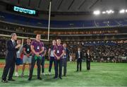 19 June 2017; Ireland captain Rhys Ruddock waits to make a presentation to Shigeyuki Watanabe, Director, Japan American Football Association, during half-time in the Pearl Bowl, at the American Football East Japan Shakaijin Championship Final game between the IBM BigBlue and the OBIC Seagulls, in the Tokyo Dome in Tokyo, Japan. Photo by Brendan Moran/Sportsfile