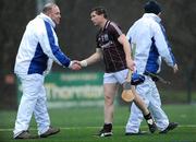 29 January 2012; Damien Hayes, Galway, shakes hands with an umpire after the game. Bord na Mona Walsh Cup, University College Dublin v Galway, Belfield, Co. Dublin. Picture credit: Dáire Brennan / SPORTSFILE