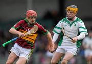11 February 2012; Richard Cummins, Gort, in action against Alan Corcoran, Coolderry. AIB GAA Hurling All-Ireland Senior Club Championship Semi-Final, Coolderry, Offaly, v Gort, Galway, Gaelic Grounds, Limerick. Picture credit: Stephen McCarthy / SPORTSFILE