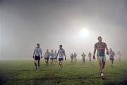 1 February 2012; Dublin and Mayo players leave the pitch at half time. The game was subsequently abandoned, due to heavy fog, by referee Marty Duffy before the start of the second half. Allianz Football League, Division 1, Round 2, Mayo v Dublin, McHale Park, Castlebar, Co. Mayo. Picture credit: David Maher / SPORTSFILE