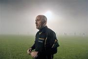 11 February 2012; Referee Marty Duffy views the pitch before deciding to abandon the game, due to heavy fog, before the start of the second half. Allianz Football League, Division 1, Round 2, Mayo v Dublin, McHale Park, Castlebar, Co. Mayo. Picture credit: David Maher / SPORTSFILE