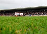 12 February 2012; The Tyrone players stand for the national anthem. Allianz Football League, Division 2, Round 2, Tyrone v Derry, Healy Park, Omagh, Co Tyrone. Picture credit: Brian Lawless / SPORTSFILE