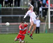 12 February 2012; Owen Mulligan, Tyrone, in action against PJ Quinn, Derry. Allianz Football League, Division 2, Round 2, Tyrone v Derry, Healy Park, Omagh, Co Tyrone. Picture credit: Brian Lawless / SPORTSFILE